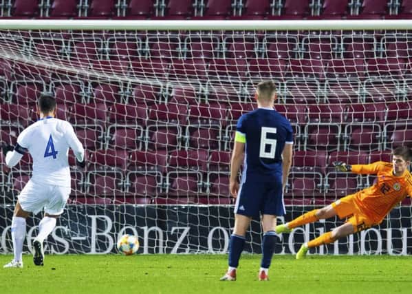 Dimitos Nikolaou scores with a late penalty to give Greece a 1-0 victory at Tynecastle. Picture: SNS.