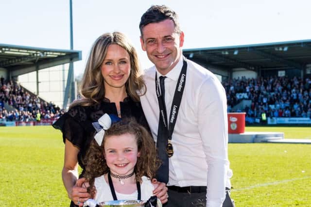 Celebration time for Jack Ross and his family as the Championship title is clinched for St Mirren. Picture: SNS.