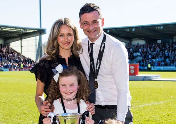 Celebration time for Jack Ross and his family as the Championship title is clinched for St Mirren. Picture: SNS.