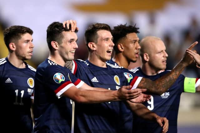 Scotland's John McGinn celebrates scoring Scotland's second. Pic: Tim Goode/PA