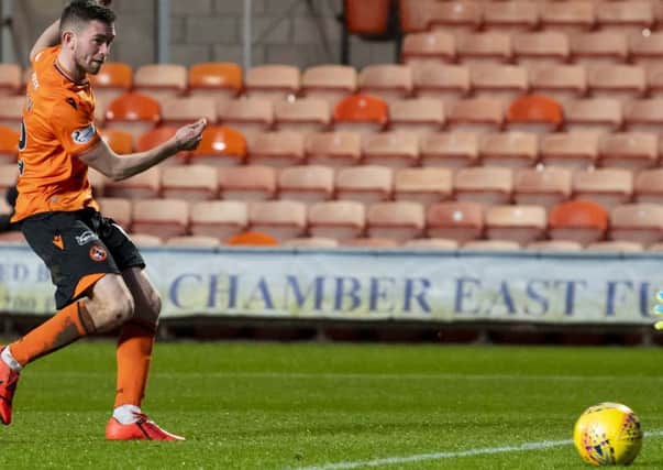 Sam Stanton scores Dundee United's third goal in their 3-0 victory over Queen of the South. Picture: Ross Parker / SNS.