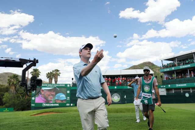 Bob MacIntyre throws his ball into the crowd after carding a seven-under-par 65 in the third round of the Nedbank Challenge in Sun City. Picture: Getty Images