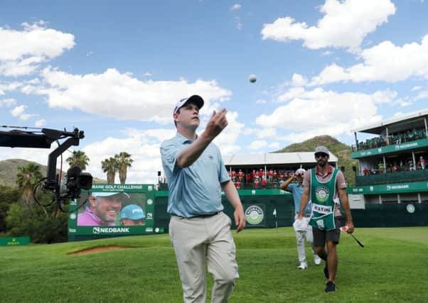 Bob MacIntyre throws his ball into the crowd after carding a seven-under-par 65 in the third round of the Nedbank Challenge in Sun City. Picture: Getty Images