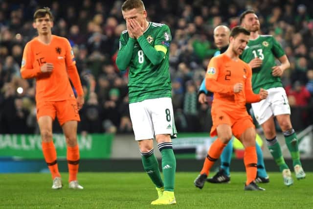 Steven Davis reacts after missing a penalty for Northern Ireland against the Netherlands at Windsor Park. Picture: Mike Hewitt/Getty Images