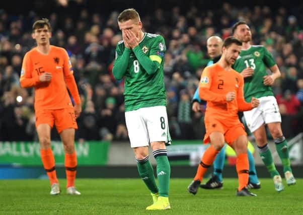 Steven Davis reacts after missing a penalty for Northern Ireland against the Netherlands at Windsor Park. Picture: Mike Hewitt/Getty Images