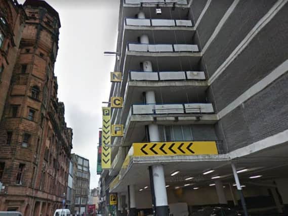 The man was discovered in the NCP car park on Mitchell Street.