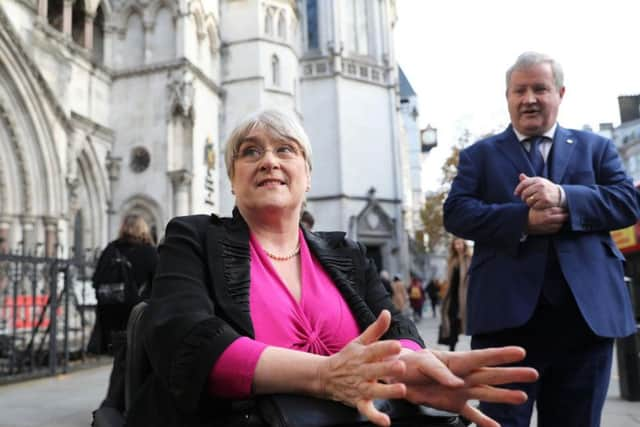 Democrat President Sal Brinton and SNP Westminster leader Ian Blackford at the Royal Courts of Justice, London.