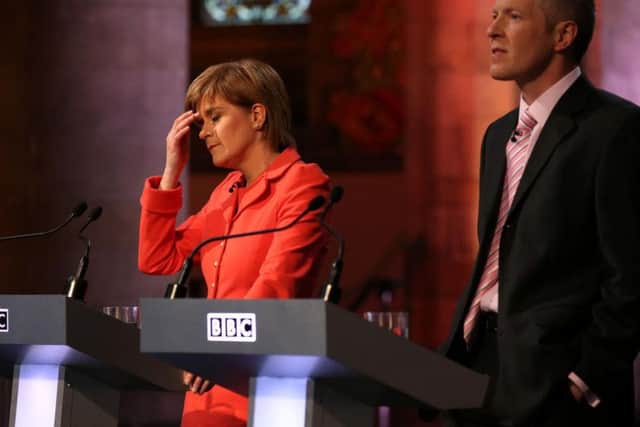 Nicola Sturgeon and Willie Rennie take part in a 2015 leaders' debate broadcast by the BBC. Picture: PA
