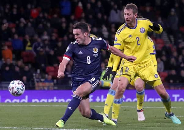 John McGinn completes Scotland's 3-1 win over Kazakhstan with his second goal of the night in the 90th minute.