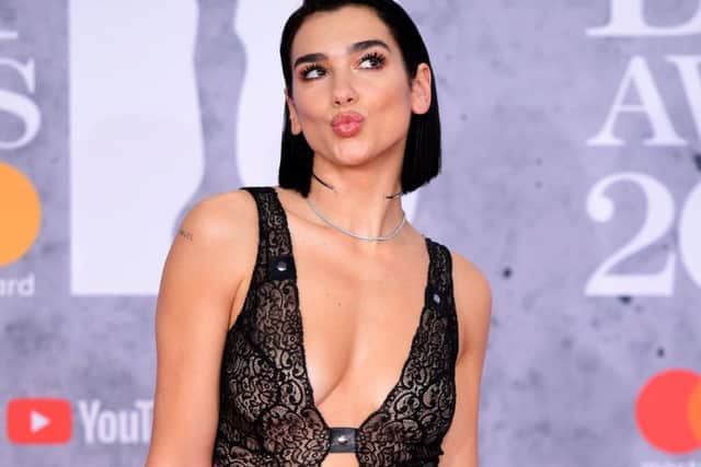 Ed Sheeran, Dua Lipa (pictured) and Sam Smith are among the British artists driving a surge in exports as the UK music industry.