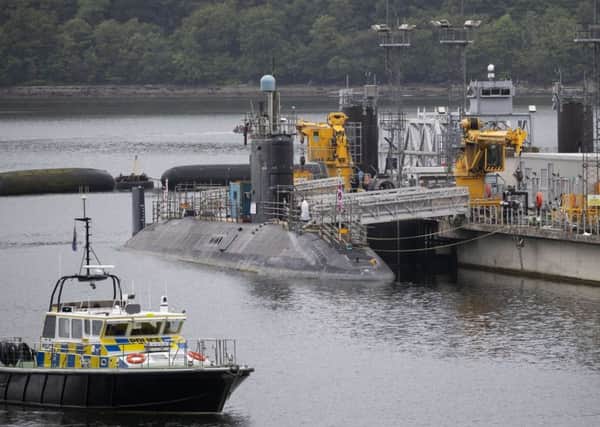 A Vanguard class nuclear submarines in the dock at HM Naval Base Clyde (Picture: Jane Barlow/PA Wire)