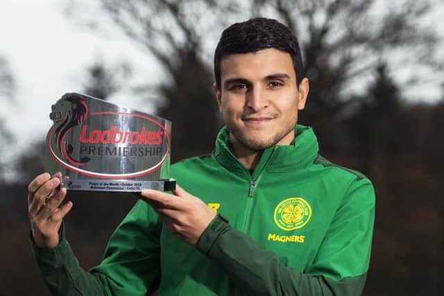 Celtic's Mohamed Elyounoussi with his Ladbrokes Premiership Player of the Month award for October. Picture: Paul Devlin/SNS