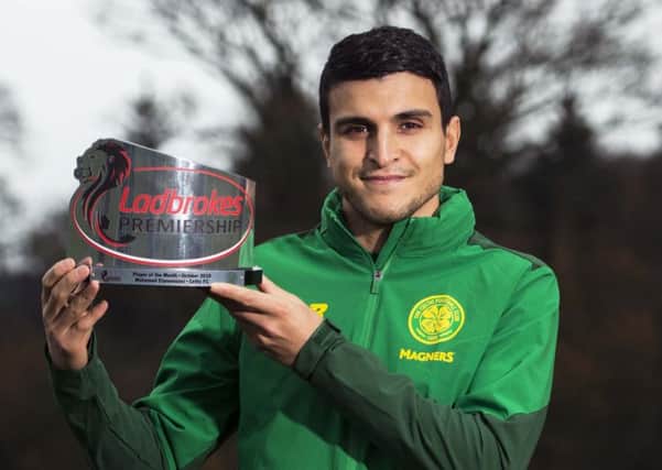 Celtic's Mohamed Elyounoussi with his Ladbrokes Premiership Player of the Month award for October. Picture: Paul Devlin/SNS