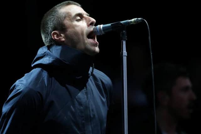 Liam Gallagher last night apologised to a 27-year-old female fan left "scarred for life" by a flare thrown during one of his gigs this week.