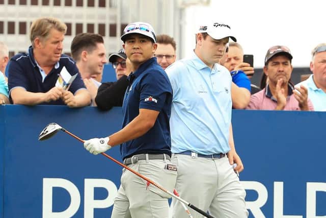 Kurt Kityama and Bob MacIntyre during the first day of the DP World Tour Championship in Dubai. Picture: Andrew Redington/Getty Images