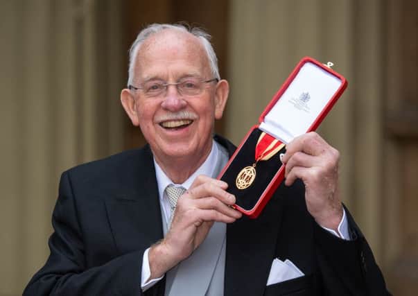 Sir Boyd Tunnock with his knighthood following the investiture ceremony at Buckingham Palace. Picture: Dominic Lipinski - WPA/Getty Images