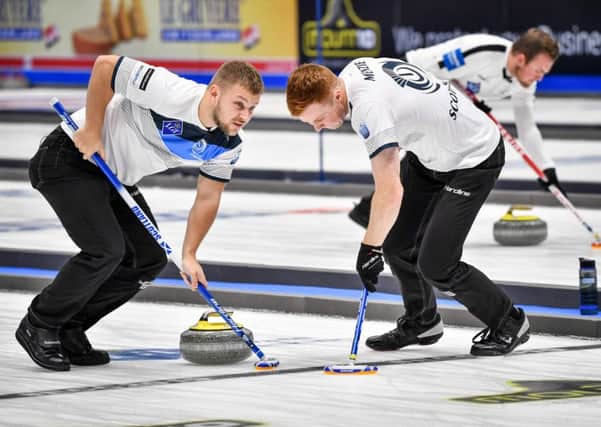Scotland's Kyle Waddell and Duncan Menzies during the defeat by Sweden in the semi-final of the European Curling Championships in Helsingborg. Picture: AFP via Getty Images