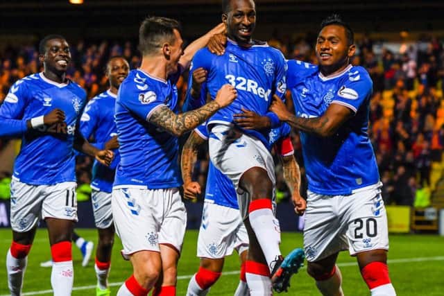 Glen Kamara celebrates a goal for Rangers with his team-mates