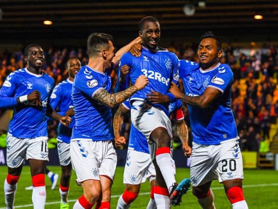 Glen Kamara celebrates a goal for Rangers with his team-mates