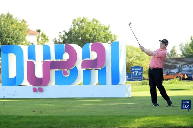 Bob MacIntyre hits hits third shot from the drop zone after finding water at the 17th in the second round of the DP World Tour Championship in Dubai. Picture: Getty Images