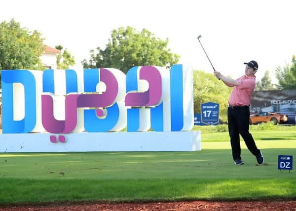 Bob MacIntyre hits hits third shot from the drop zone after finding water at the 17th in the second round of the DP World Tour Championship in Dubai. Picture: Getty Images