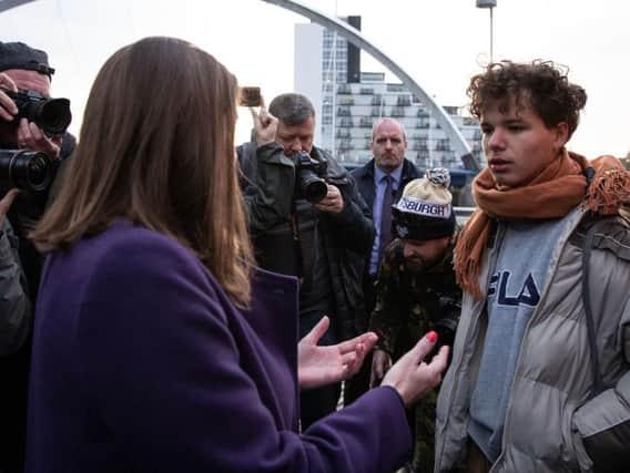 Ms Swinson is confronted by student Jay Sutherland while on the campaign trail in Glasgow.