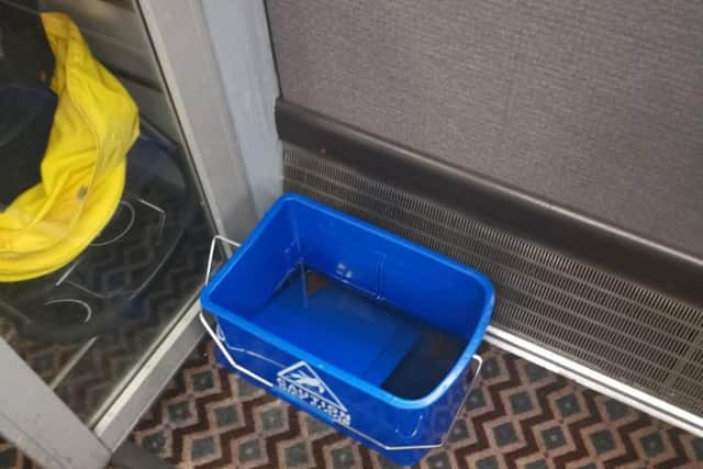 ScotRail said the buckets were because of "water ingress from the ceiling". Picture: Contributed