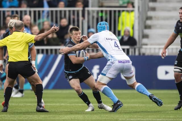 Neat handling and quick thinking by George Horne, pictured here with with Sale's Bryn Evan, led to a fine Glasgow try. Picture: SNS/SRU.