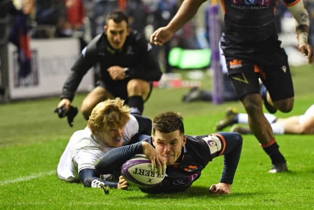 Blair Kinghorn scores the first try but Edinburgh eventually had to settle for a share of the points. Picture: SNS