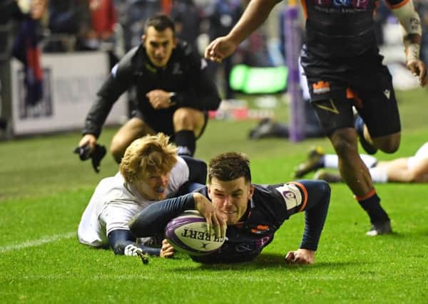 Blair Kinghorn scores the first try but Edinburgh eventually had to settle for a share of the points. Picture: SNS