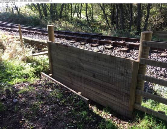 One of the experimental lowered sections of fence at Morvich on the Inverness-Thurso line. Picture: Network Rail