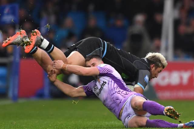 Glasgow winger DTH van der Merwe is tackled by Exeter's Joe Simmonds. Picture: Stu Forster/Getty Images
