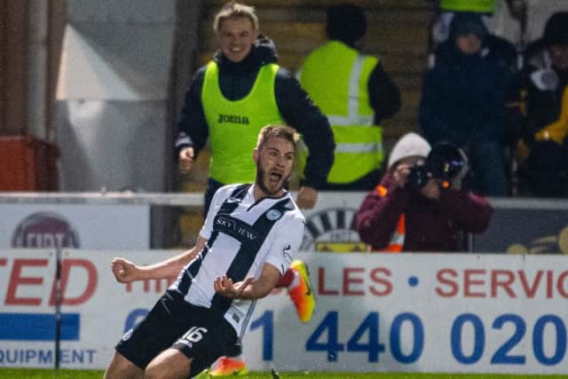 Sam Foley celebrates after scoring the winning goal against Ross County. Picture: SNS