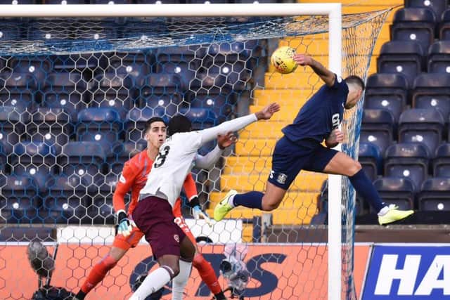 Eamonn Brophy heads Kilmarnock two goals in front. Picture: SNS