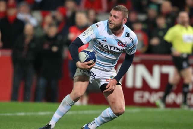Racing 92's Scottish stand-off Finn Russell reacts after scoring a try against Munster. Picture: AFP via Getty Images