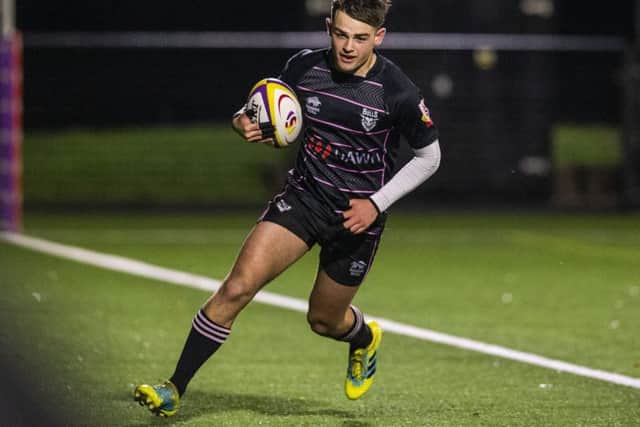 Ayrshire's Ross Thomspon scores a first half try against Southern Knights. Picture: SNS