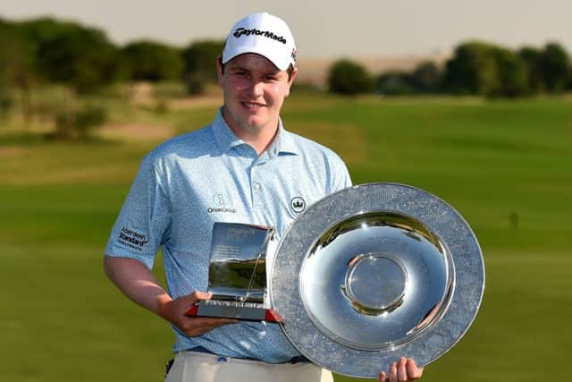Bob MacIntyre shows off the Sir Henry Cotton Rookie of Year and Challenge Tour Graduate of the Year Trophy in Dubai. Picture: Getty Images