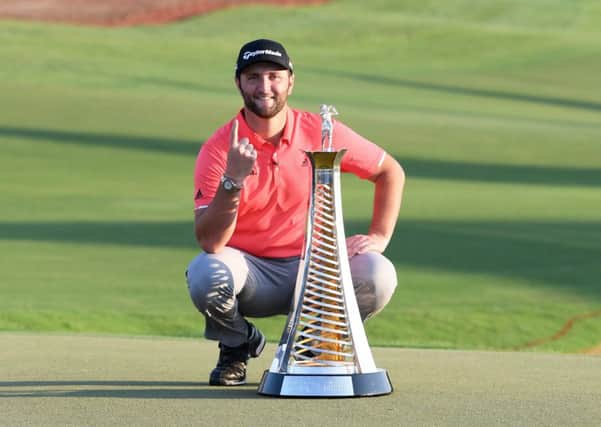 Jon Rahm poses with the Race to Dubai trophy following his victory at the DP World Tour Championship Dubai at Jumerirah Golf Estates. Picture: Ross Kinnaird/Getty Images