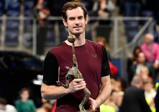 Andy Murray celebrates with the trophy after winning  the European Open  in Antwerp.
