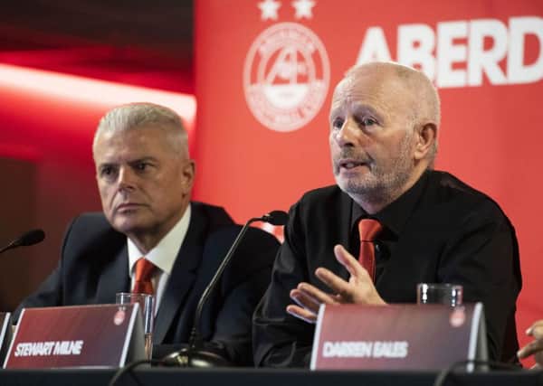 Outgoing Aberdeen chairman Stewart Milne, right, will be handing the reins to Dave Cormack. Picture: Craig Foy/SNS