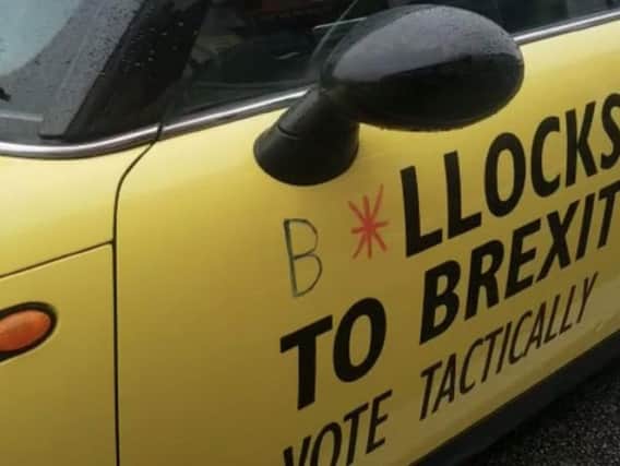 The police forced the driver to remove the 'B' and 'O' from the slogan.