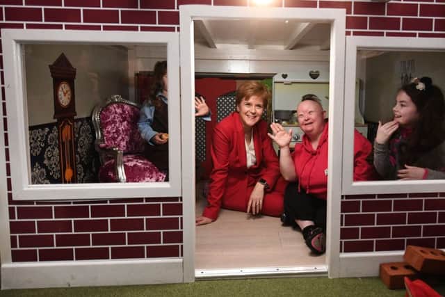 Nicola Sturgeon on the campaign trail in Uddingston yesterday where the SNP leader aid it was for the people to decide when a second vote on independence should take place. Picture: John Devlin
