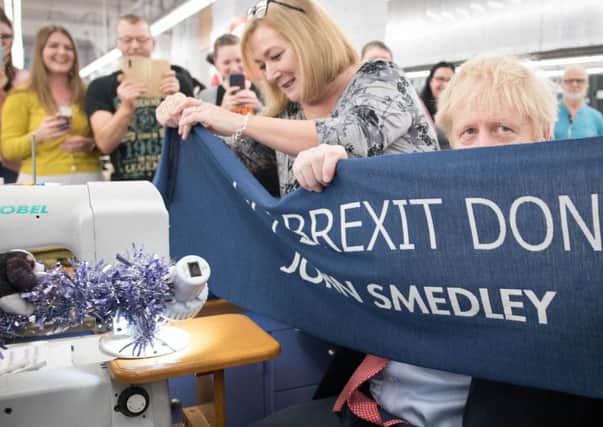 Boris Johnsons get Brexit done slogan is meaningless and misleading, says Joyce McMillan (Picture: Stefan Rousseau/PA Wire)