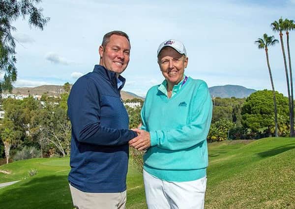 LPGA commissioner Mike What and LET Board chair Marta Figueras-Dotti shake on the merger between the circuits after a meeting in Spain