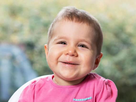 Amelia Topa, who turns two today, isin remission from leukaemia after having a stem cell transplant using a newborn babys umbilical cord blood which was specially flown in from America. Picture: Cancer Research