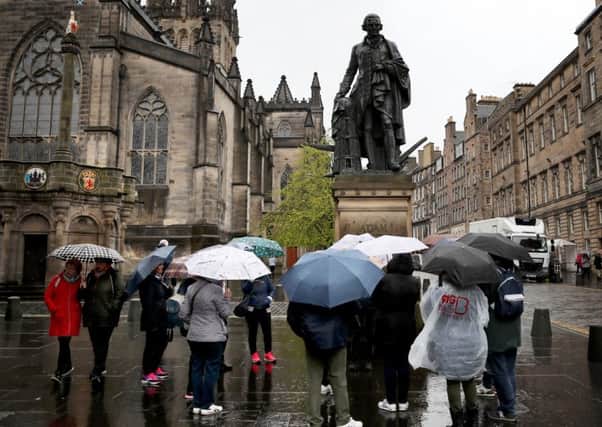 Tourists on Edinburgh's Royal Mile