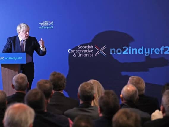Prime Minister Boris Johnson unveiling the Scottish Conservative manifesto