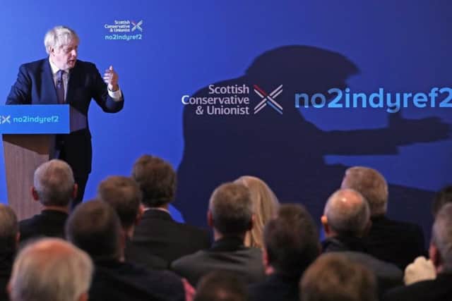 Prime Minister Boris Johnson unveiling the Scottish Conservative manifesto