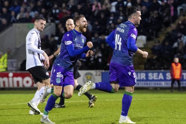 Martin Boyle celebrates Stevie Mallan's goal in Hibs' 2-1 win over St Mirren on Tuesday. Picture: Ross Parker/SNS