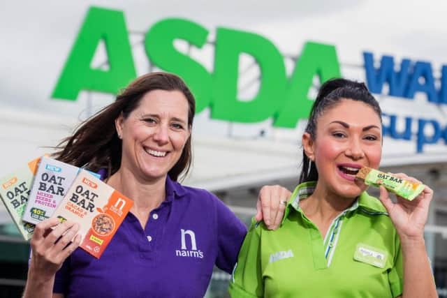 Nairn's account controller Amy Morrison and Asda customer service assistant Manila Margiotta celebrate Nairn's Oat Bar listing. Picture: Ian Georgeson